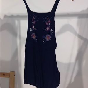Dark blue romper with floral embroidery